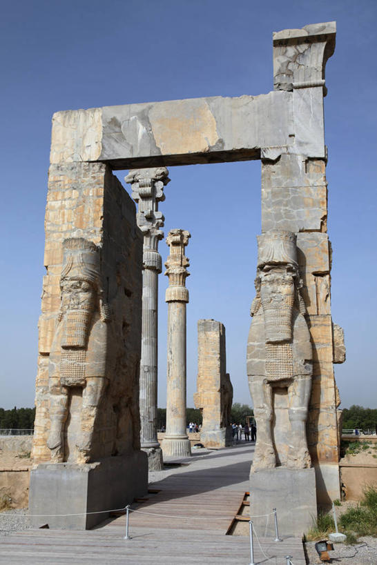 无人,竖图,室外,白天,正面,旅游,度假,石头,名胜古迹,门,标志建筑,地标,建筑,阴影,破旧,遗迹,陈旧,光线,石子,影子,首都,古迹,文物,娱乐,建设,古建筑,蓝色,蓝天,天空,阳光,门框,天,享受,休闲,旅游胜地,放松,晴朗,残破,古文明,万里无云,阿黑门尼德王朝,阿契美尼德王朝,阿契美尼德帝国,波斯波利斯,波斯帝国,石块,岩石,晴空,晴空万里,彩图