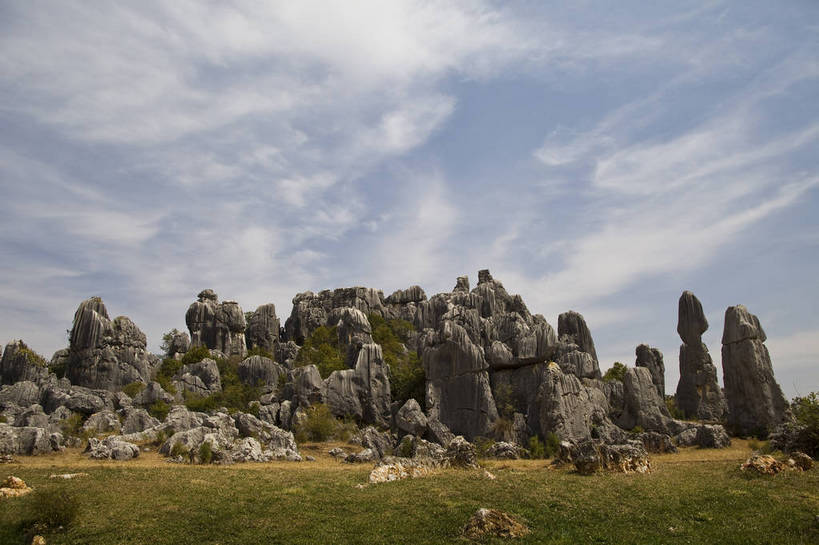 无人,横图,彩色,室外,白天,旅游,度假,石头,名胜古迹,石林,标志建筑,地标,建筑,昆明,中国,亚洲,遗迹,石子,图片,巨石,古迹,文物,娱乐,建设,古建筑,云南,树木,享受,休闲,旅游胜地,放松,摄影,文明,中国文化,自然风光,昆明市,古文明,东亚,云南省,中华人民共和国,省会,西南地区,滇,自然遗产,石林县,石林彝族自治县,石块,岩石,旅行,云南石林地质公园,传统文化,bj174